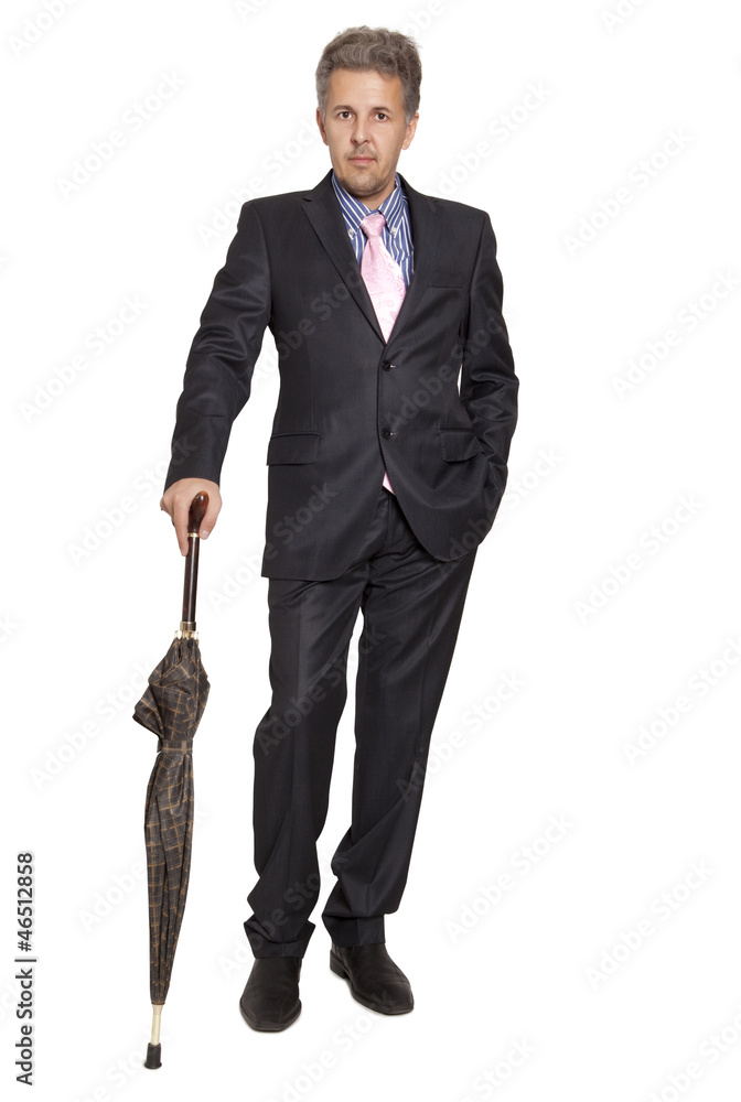 Businessman under an umbrella over white background Businessman under an umbrella over white background