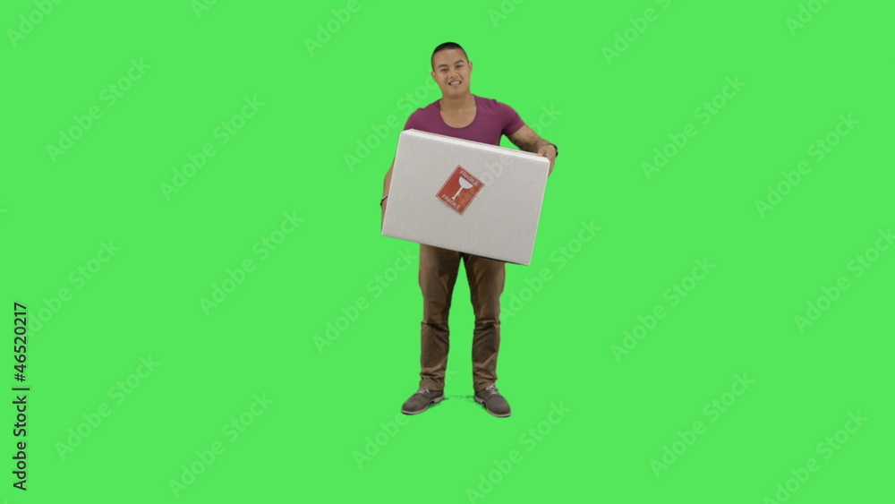 Young adult carrying box for delivery Young adult carrying box for delivery
