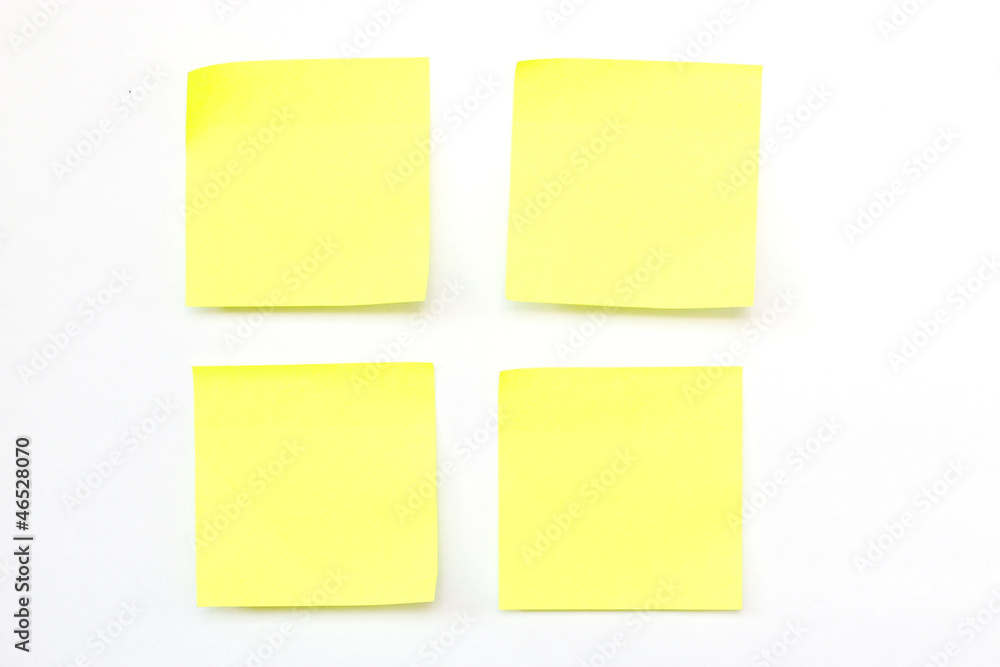 four blank yellow memo stick isolated on white background four blank yellow memo stick isolated on white background