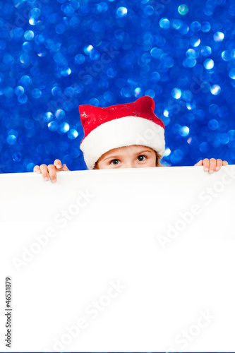 Christmas - lovely girl Santa Claus with white board © Gorilla
