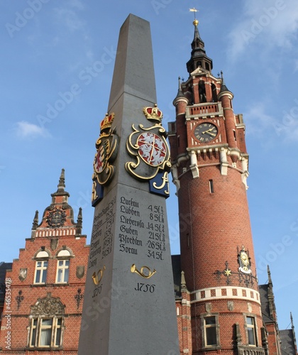 Postsäule und Rathaus in Dahme photo