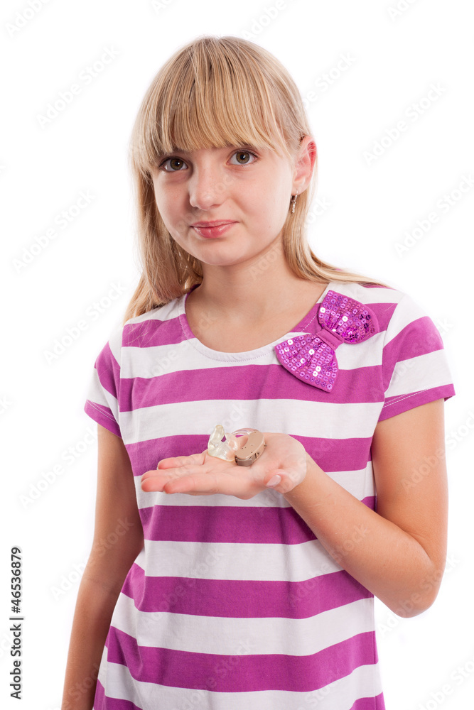 Young girl with hearing aid Young girl with hearing aid