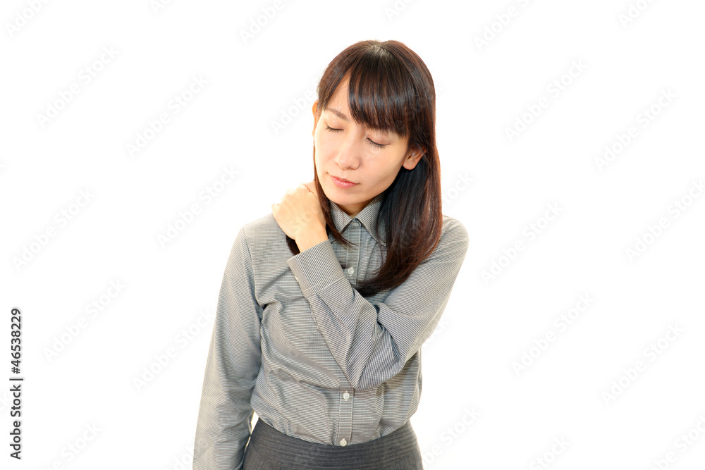 肩こりに悩むオフィスレディー 肩こりに悩むオフィスレディー