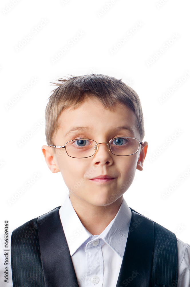 A young boy in glasses A young boy in glasses