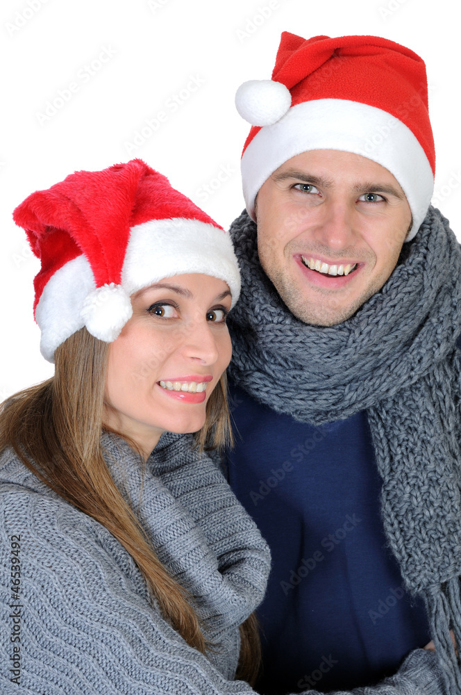 Smiling couple in Santa Claus Hat Smiling couple in Santa Claus Hat