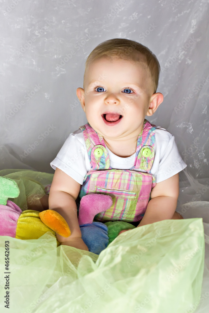 Fototapeta premium Infant sitting and smiling
