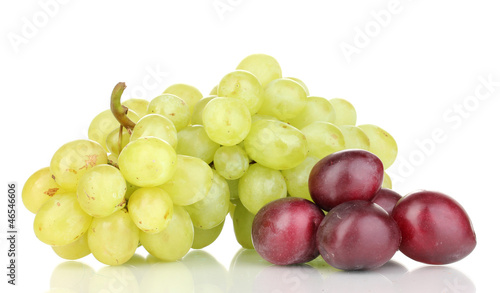 ripe sweet grapes and plums isolated on white