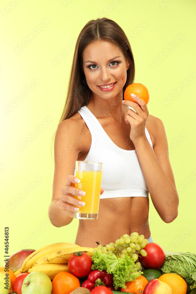 beautiful young woman with fruits and vegetables and glass of beautiful young woman with fruits and vegetables and glass of