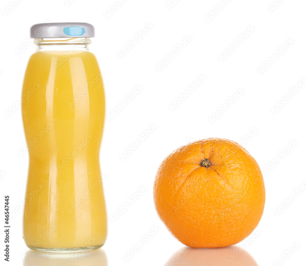 Delicious orange juice in a bottle and orange next to it Delicious orange juice in a bottle and orange next to it