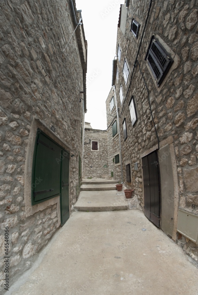 Narrow old street in stone, Croatia
