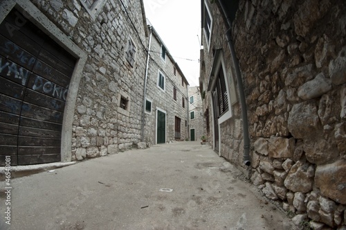 Narrow old street in stone, Croatia