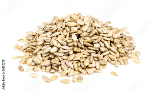 fresh sunflower seeds isolated on a white background