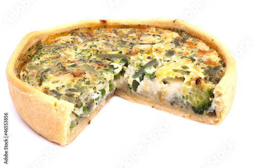 Vegetable quiche on white background