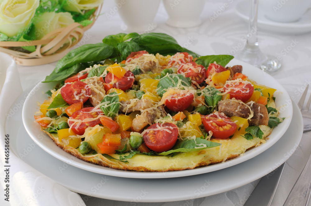 Omelet with vegetables and slices of bacon Omelet with vegetables and slices of bacon