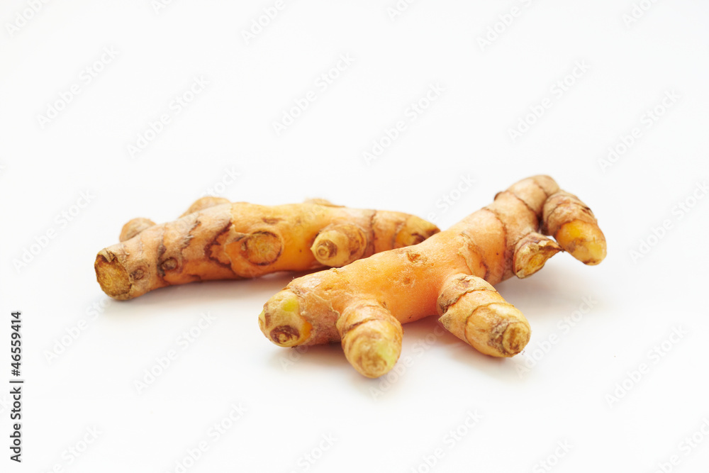 Turmeric root on white background Turmeric root on white background