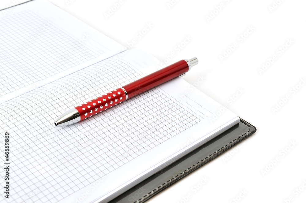 Notebook and pen isolated on white Notebook and pen isolated on white