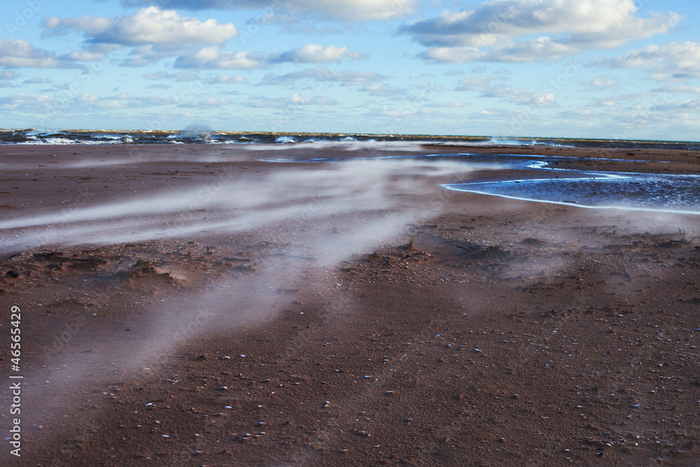 Sand and wind.