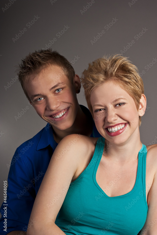 Beautiful young happy smiling couple. isolated Beautiful young happy smiling couple. isolated