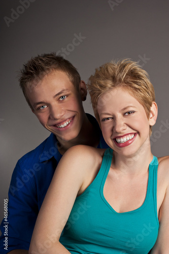 Beautiful young happy smiling couple. isolated