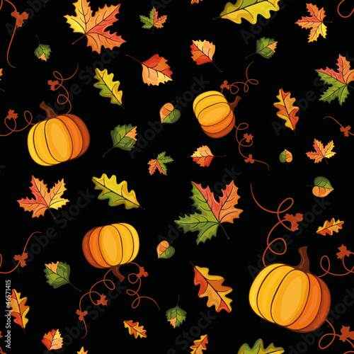 vector pattern with the image of autumn leaves and pumpkins