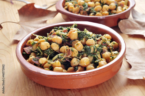 spanish espinacas con garbanzos, spinach with chickpeas, served