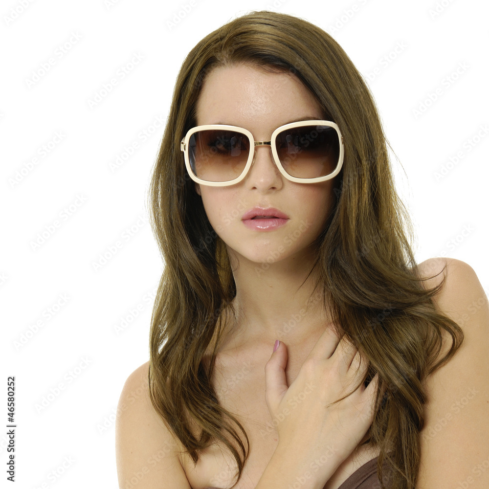Portrait of beautiful sexy woman in sunglasses posing Portrait of beautiful sexy woman in sunglasses posing