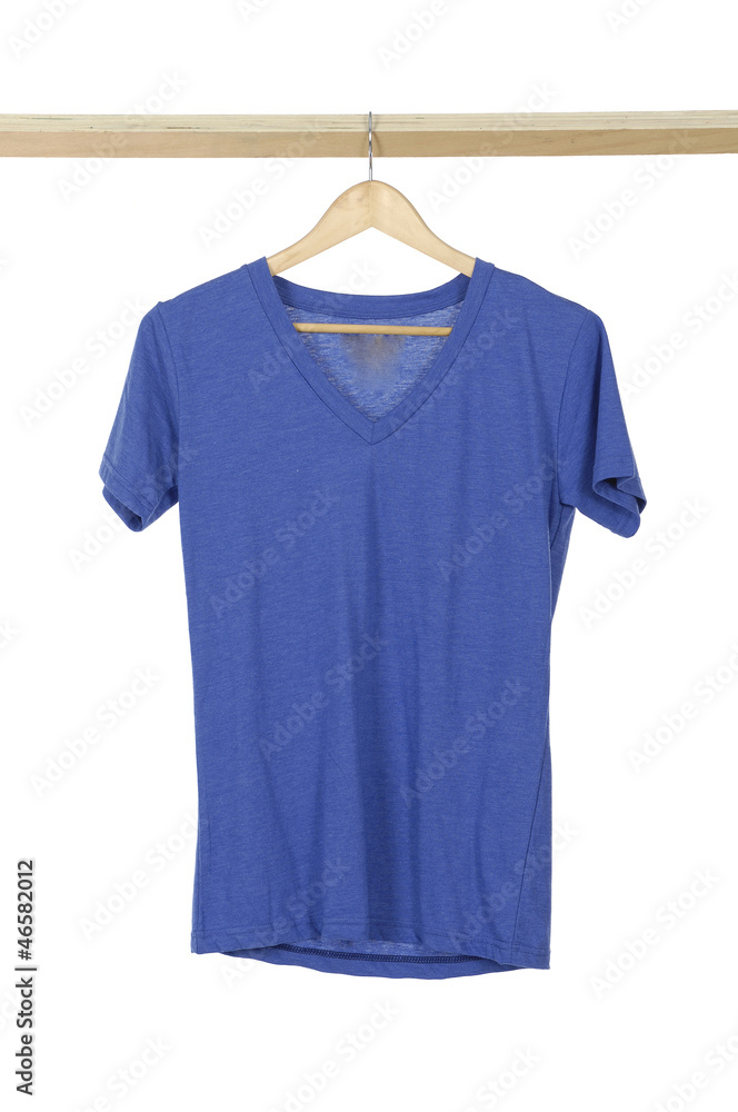 Blue clothes isolated hanging on wooden hangers Blue clothes isolated hanging on wooden hangers