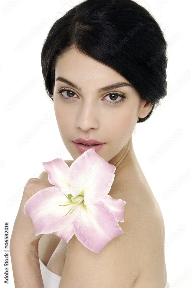 portrait of beautiful woman holding lilly flower in her hands portrait of beautiful woman holding lilly flower in her hands
