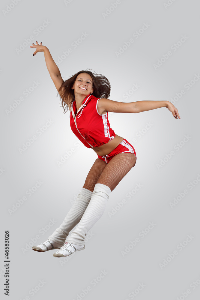 Young female dancer against white background Young female dancer against white background