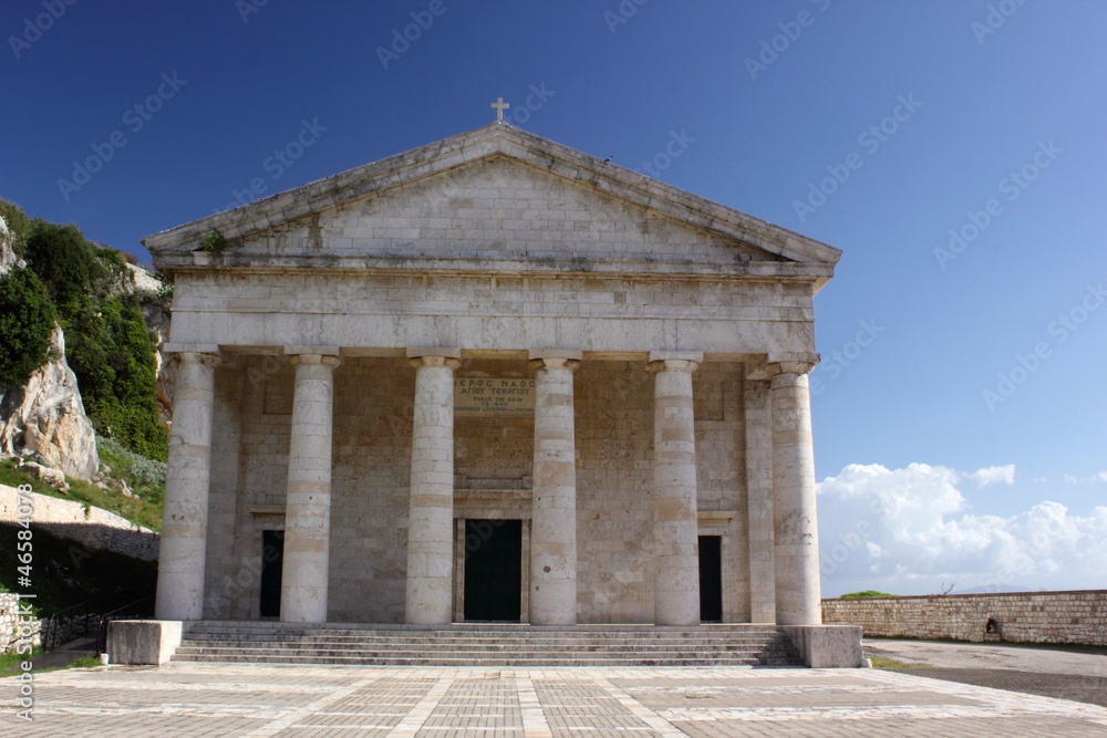 classic Greek stone marble carved Temple architecture with ionic pillars and columns on the island of Corfu Greece	
