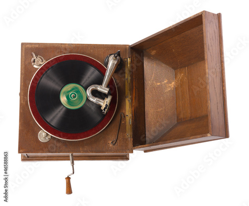 Top view of old wooden gramophone against white background