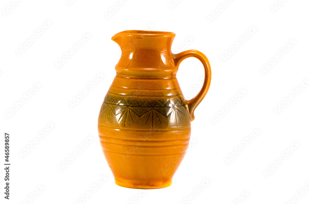brown ceramics jug on white