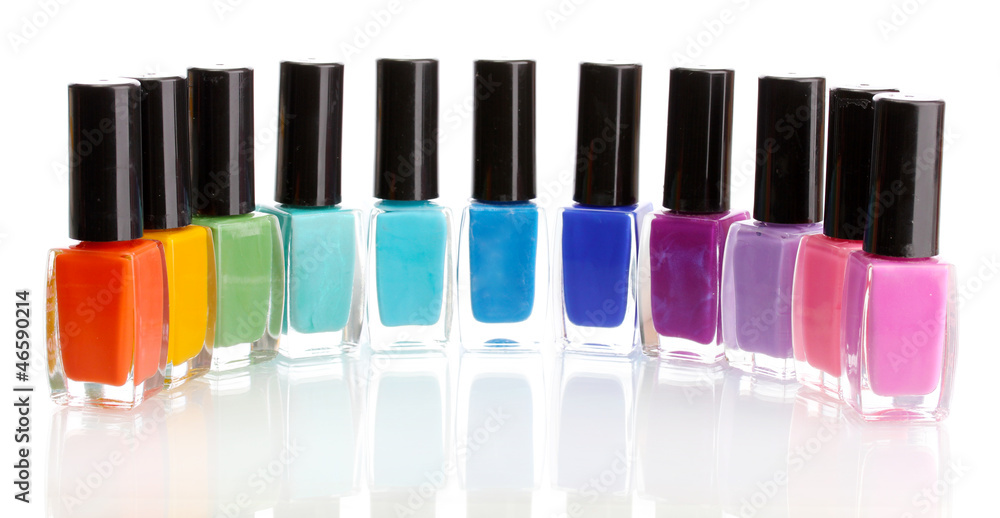 Group of bright nail polishes isolated on white Group of bright nail polishes isolated on white