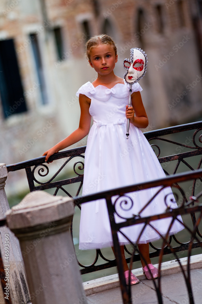 Carnival in Venice, Italy - lovely girl with carnival mask