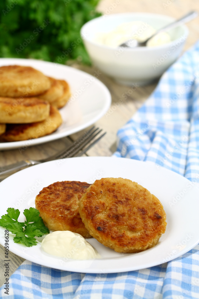 Cabbage pancakes with sour cream