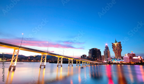 Fotografie Macau cityscape of bridge and skyscraper Macao, Asia.