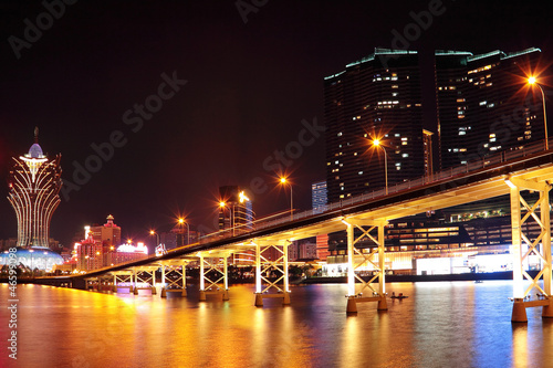 Macao cityscape with famous landmark of casino skyscraper and br