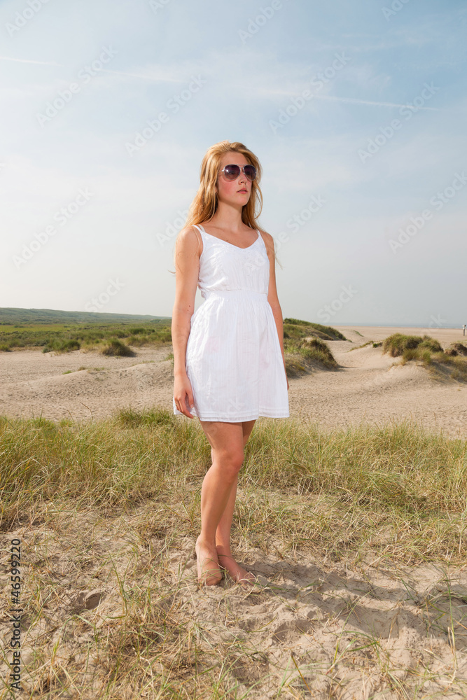 Pretty girl red long hair wearing white dress enjoying nature. Pretty girl red long hair wearing white dress enjoying nature.