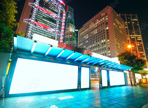 Photography Blank billboard on bus stop at night