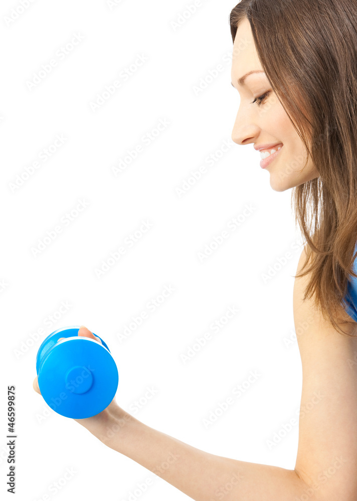 Young woman exercising with dumbbell, isolated Young woman exercising with dumbbell, isolated