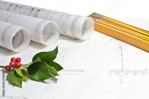 heap of architect design and project drawings on table christmas