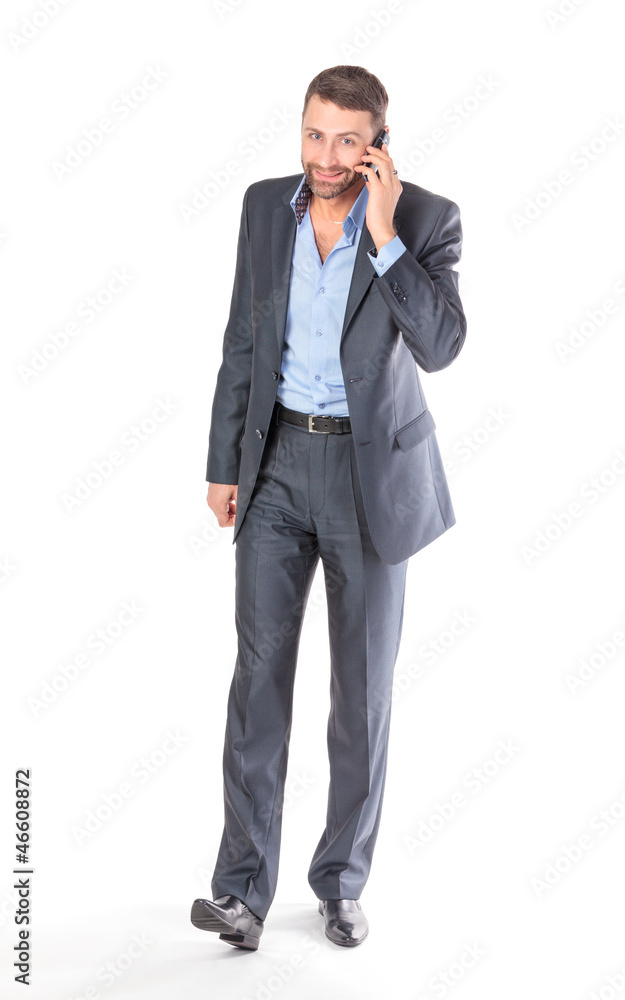Full length portrait businessman with mobile phone Full length portrait businessman with mobile phone