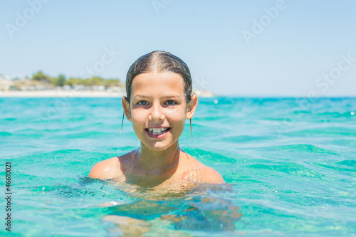 Wallpaper Mural Young girl playing in the sea Torontodigital.ca