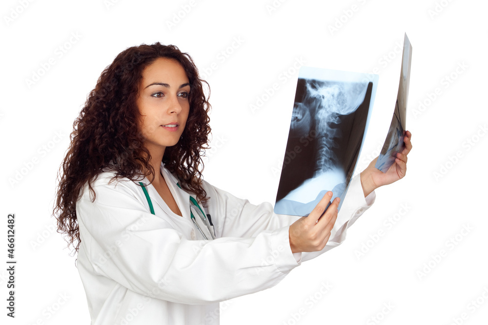 Brunette spanish doctor woman looking a radiography Brunette spanish doctor woman looking a radiography