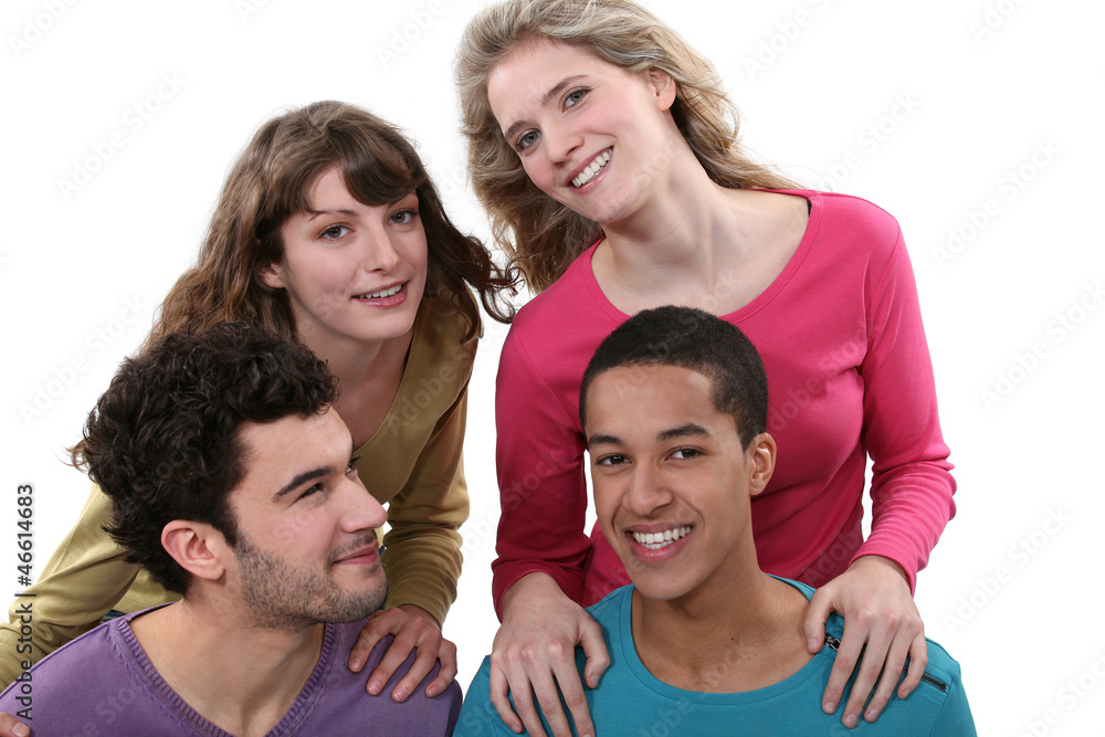 Two couples doing a piggy back ride race. Two couples doing a piggy back ride race.