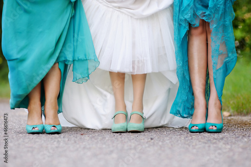 Bride and bridesmaids show off their shoes