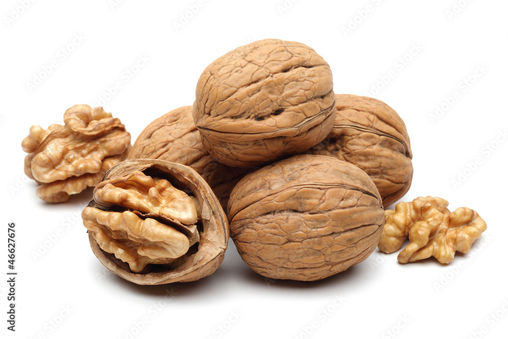 Heap of walnuts isolated on white background Heap of walnuts isolated on white background