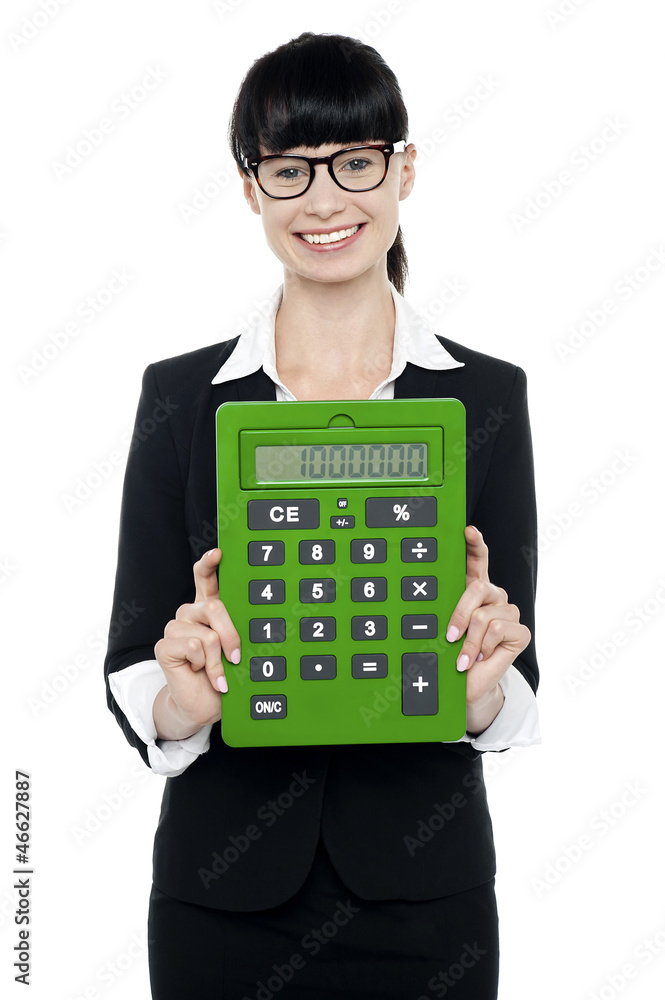 Pretty female executive showing calculator Pretty female executive showing calculator