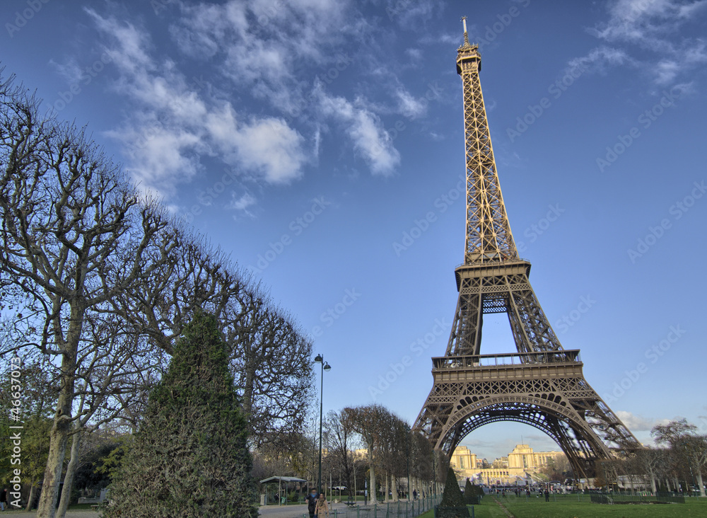Eiffel Tower and Champ de Mars in Paris, France. Famous landmark