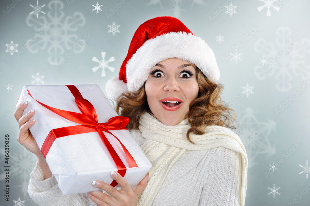 Beautiful young woman with Christmas present box Beautiful young woman with Christmas present box